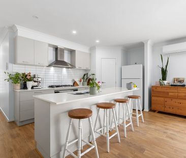 Low Maintenance & Beautifully Appointed! - Photo 4