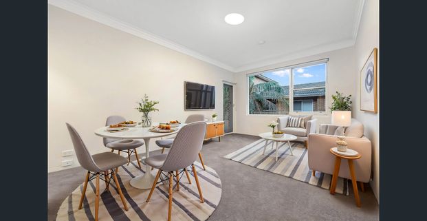 Spacious 2-Bedroom Unit in Prime Location - Photo 1