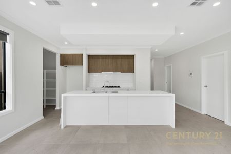 Fully Upgraded 3-Bedroom Beauty — Ready to Move in - Photo 2