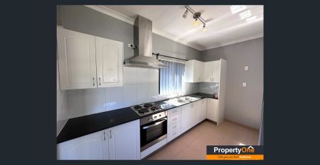 Quiet street this solid brick home for RENT. Don't miss out. - Photo 2