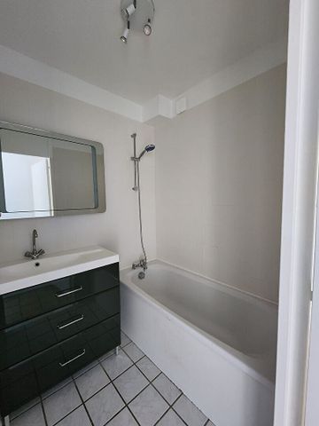 À LOUER / Bel appartement 4 pièces avec parking et cave rue de Taissy ! - Photo 4