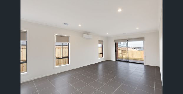 MODERN FOUR BEDROOM TWO LIVING AREA HOME LOCATED IN WINTER VALLEY - Photo 1