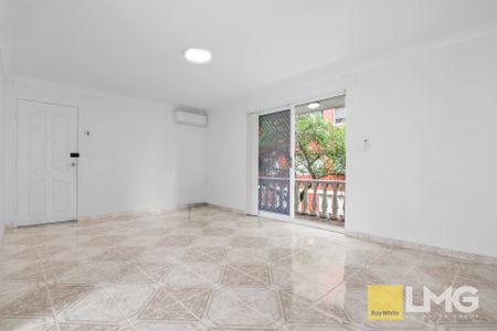 WELL-MAINTAINED BLOCK & APARTMENT - Photo 5