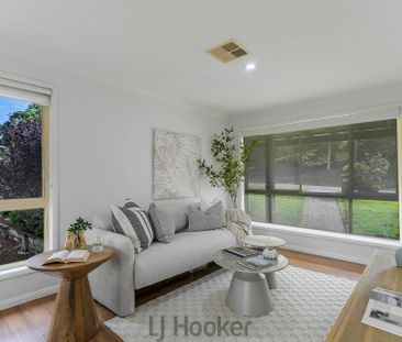 Stylish Family Retreat in the Heart of Tingira Heights - Photo 1