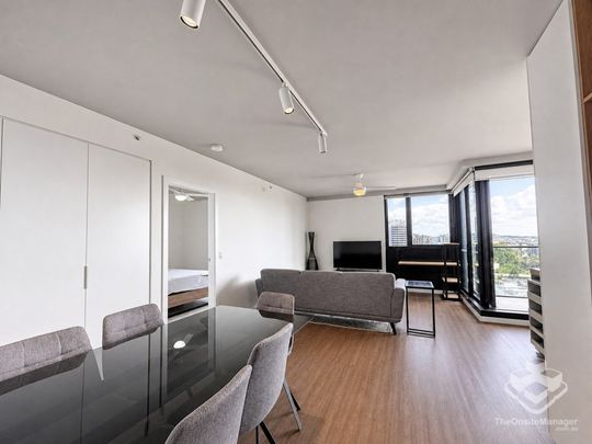 Furnished High-Floor Apartment with Elevated Views and Two-Car Parking - Photo 1