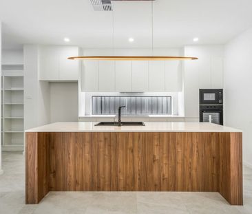 Spacious and Modern Four-Bedroom Home in Spring Farm - Photo 3