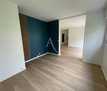 Location Appartement 4 pièces 77m² - Photo 2