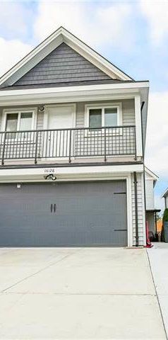 One Bedroom Coach House in Panorama Ridge - Photo 2
