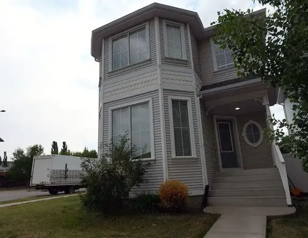 Beautiful 3-bedroom suburban home with mountain views | 168 Tuscany Springs Way Northwest, Calgary - Photo 1