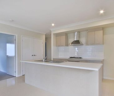 Spacious Modern Home with Ducted AC & Garden Shed - Photo 1