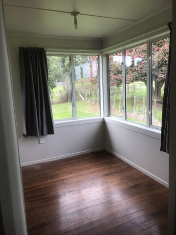 This home is need of a family, it has three bedrooms - one is of single size, open plan living, dining and kitchen, wooden floors throughout, bathroom with shower and toilet, separate laundry with a second toilet, double glazed, new coat of paint inside and out, and new curtains. - Photo 5