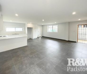 Modern Comfort with Private Yard in Convenient Punchbowl Location - Photo 1