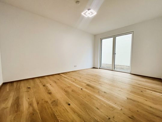 LUXUS PUR: Traumhafte 4-Zimmer-NEUBAU-Wohnung mit 103 m² großem Garten ab sofort zu mieten! - Photo 1