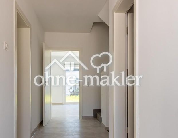 Neubau-Doppelhaushälfte mit Einliegerbereich & Garten – ideal für Familien oder Homeoffice - Foto 1