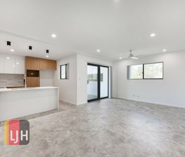 PARKSIDE TWO-BEDROOM UNIT IN A SMALL, QUIET COMPLEX - Photo 1