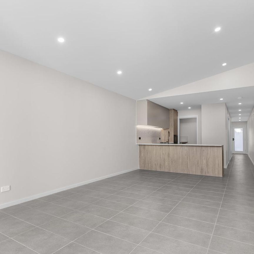 Brand New Four-Bedroom Duplex! - Photo 1
