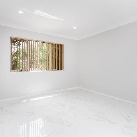 Stylishly Renovated 3-Bedroom Home - Photo 4