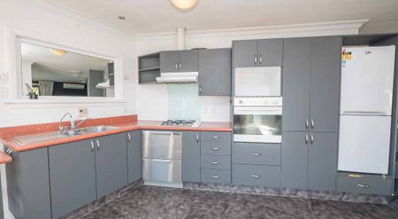 Sunny, Low-Maintenance Home and Ample Parking - Photo 3