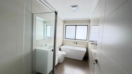 “Modern 4-Bedroom, 3-Bathroom Home – Freshly Painted with New Carpets” - Photo 2