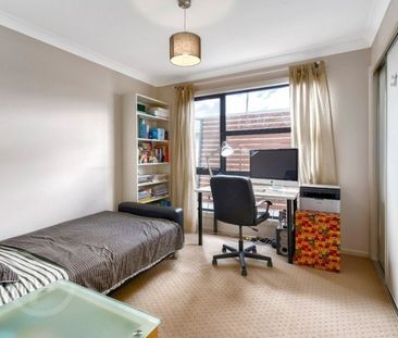 Modern Sophistication Meets Low-Maintenance Living - Photo 2