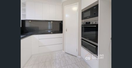 Spacious Four-Bedroom Home with Ducted AC & Dual Living Areas - Photo 2