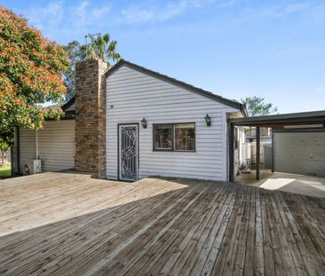 Spacious Four-Bedroom Home with a Generous Deck and Open-Plan Living - Photo 6