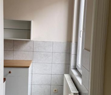 Appartement te huur in Schaarbeek voor € 715 met 1 slaapkamer - Photo 1