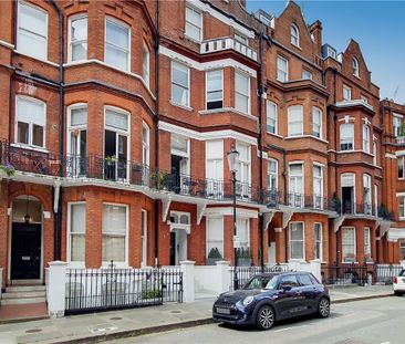 A spacious studio flat on the lower ground floor of this converted ... - Photo 2