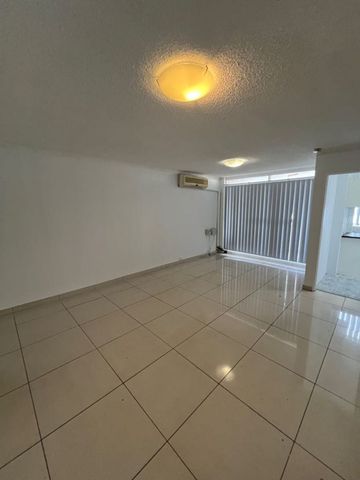 Fresh & Convenient 2-Bedroom Unit with Lock-Up Garage - Photo 2