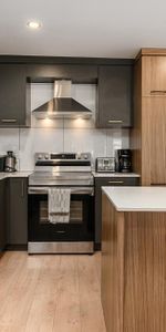 Grand 5 1/2 à Longueuil. Inclus les électroménagers, stationnement, balcon arrière privé. - Photo 3