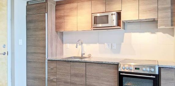 Upper One Bedroom Apartment w/ Parking at Marine Gateway Vancouver - Photo 2