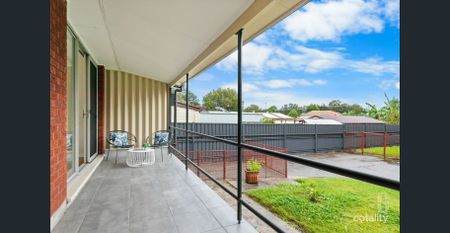 A Home with Heart in a Welcoming Neighbourhood - Photo 2