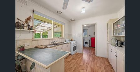 Spacious 3-Bedroom Home with a Huge Backyard in a Prime Lilydale Location - Photo 4