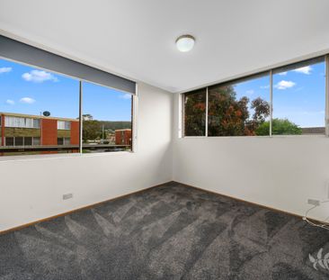 Recently Renovated Two-Bedroom Unit - Photo 2