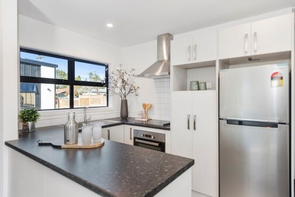 Located on Bruce Avenue, this modern two-bedroom unit offers comfortable, low-maintenance living in a fully secure setting with an automatic gate. - Photo 1