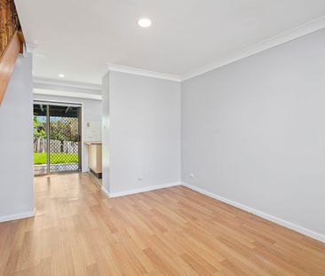 RENOVATED 2 BEDROOM TOWNHOUSE IN PRIME LOCATION! - Photo 2