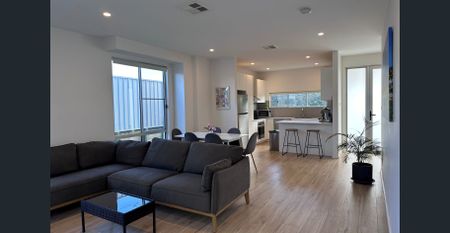 Modern Family Living | Spacious 3-Bedroom Home - Photo 5