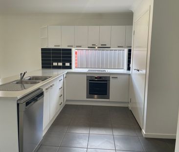 Modern Three-Bedroom Home in a Great Location - Photo 2