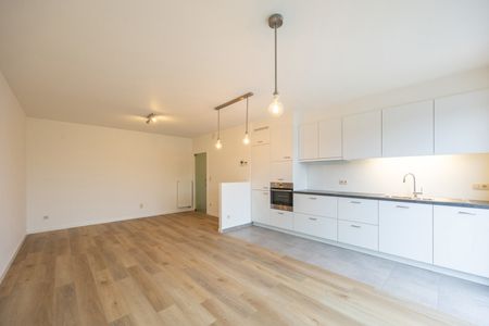 RECENT APPARTEMENT MET TERRAS EN AUTOSTAANPLAATS - Photo 2