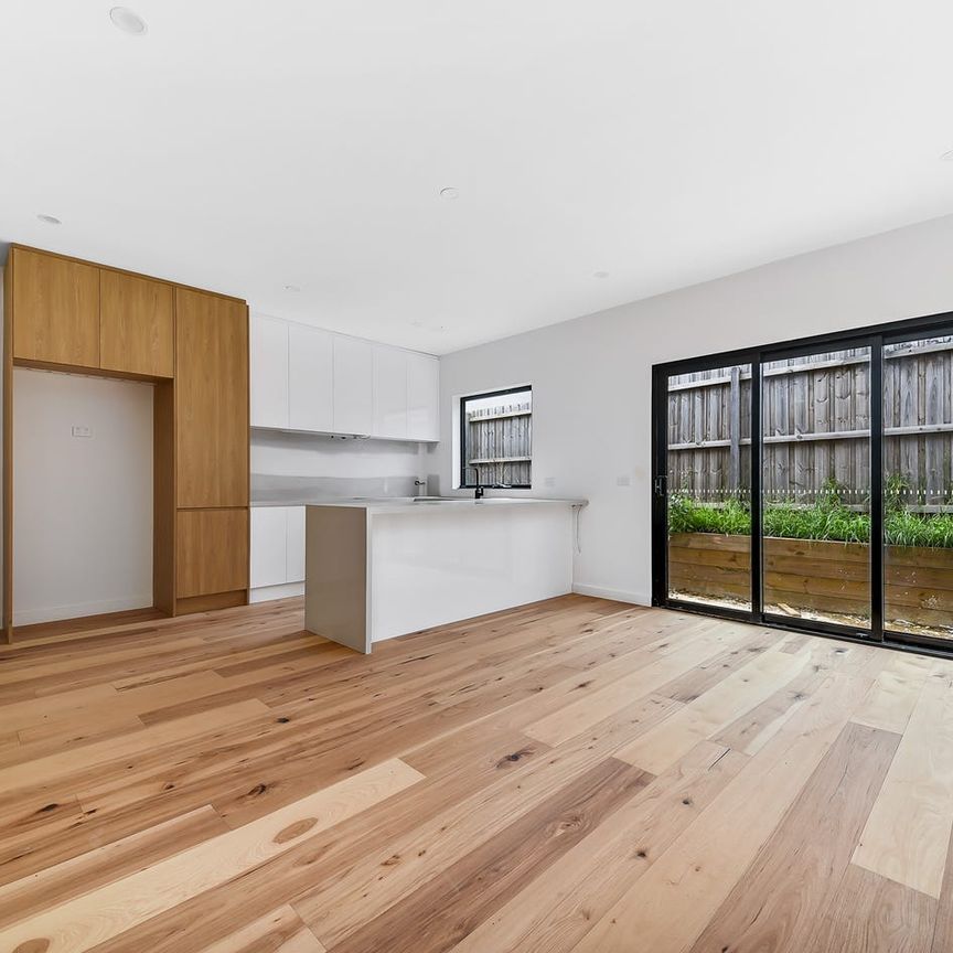 Stylish Near-New Townhouses Offering Modern, Low-Maintenance Living - Photo 1