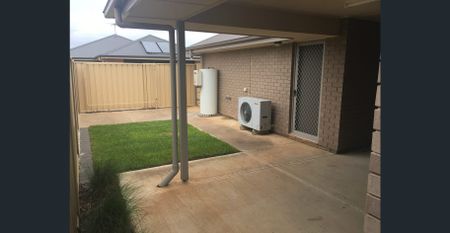 Modern 3-Bedroom, 2- Bathroom Home in Prime Location - Photo 2