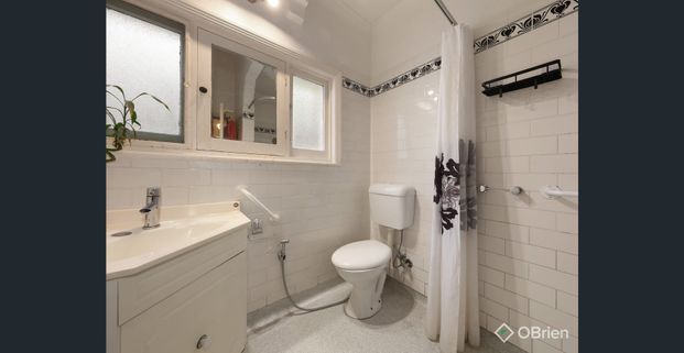 Charming Family Home with Modern Comforts & a Spacious Yard - Photo 1