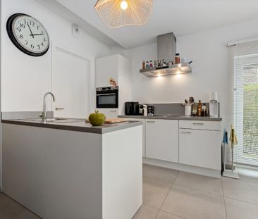 Gelijkvloers appartement met tuin en autostaanplaats - Foto 6