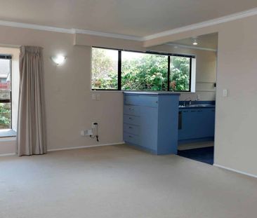 Tidy Two-Bedroom Home with Internal Garage and Charming Bay Window - Photo 5