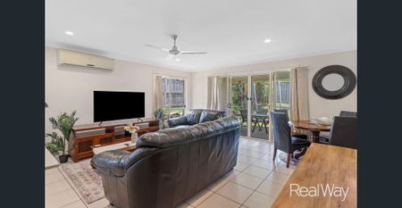 Modern Family Living in the Heart of Raceview - Photo 2