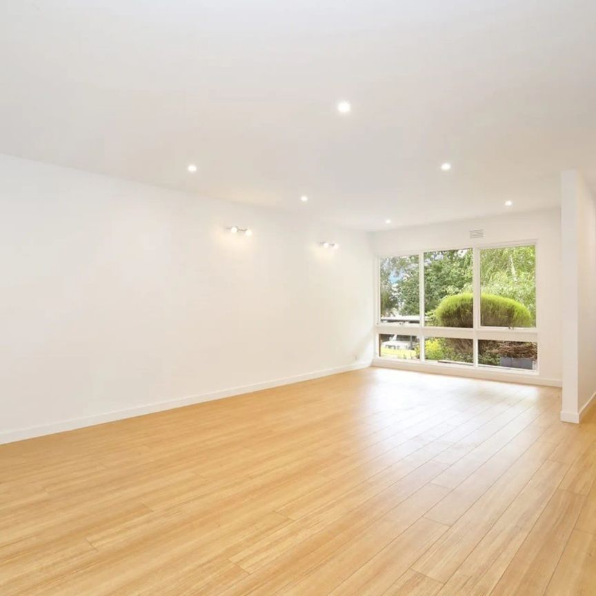 Beautifully Bright and Stylish Home in a Coveted Locale - Photo 1