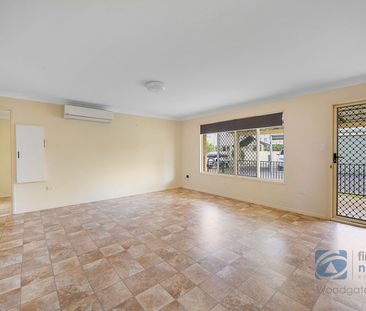 Charming Lowset Home with Private Yard and Modern Comforts - Photo 3