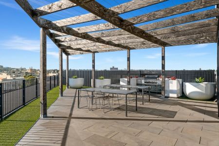 Light-Filled and Chic Bayside Living with Rooftop Oasis! - Photo 4