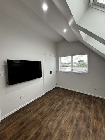 Brand New 1 Bedroom with extensive garaging - Photo 2