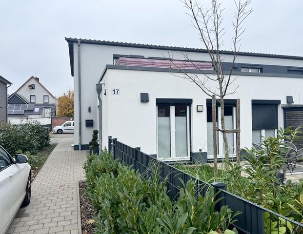 Stilvoll wohnen- moderne 3-Zimmerwohnung mit kleinem Garten - Foto 1